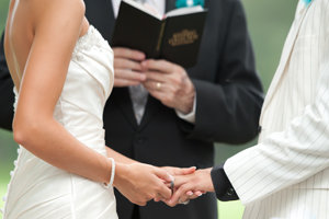 couple exchanging rings